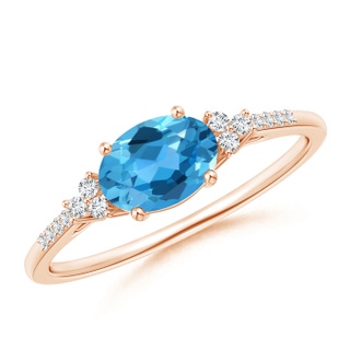 7x5mm AAA Horizontally Set Oval Swiss Blue Topaz Ring with Trio Diamonds in Rose Gold