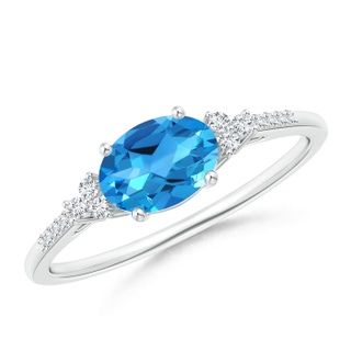 7x5mm AAAA Horizontally Set Oval Swiss Blue Topaz Ring with Trio Diamonds in White Gold