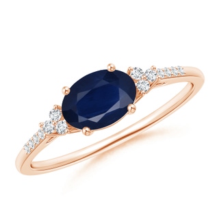 7x5mm A Horizontally Set Oval Sapphire Solitaire Ring with Trio Diamond Accents in Rose Gold