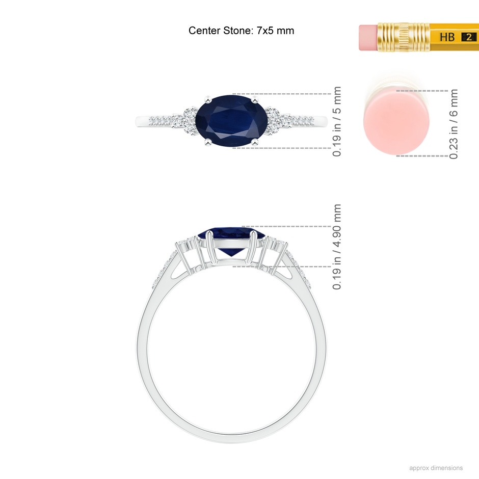 7x5mm A Horizontally Set Oval Sapphire Solitaire Ring with Trio Diamond Accents in White Gold ruler