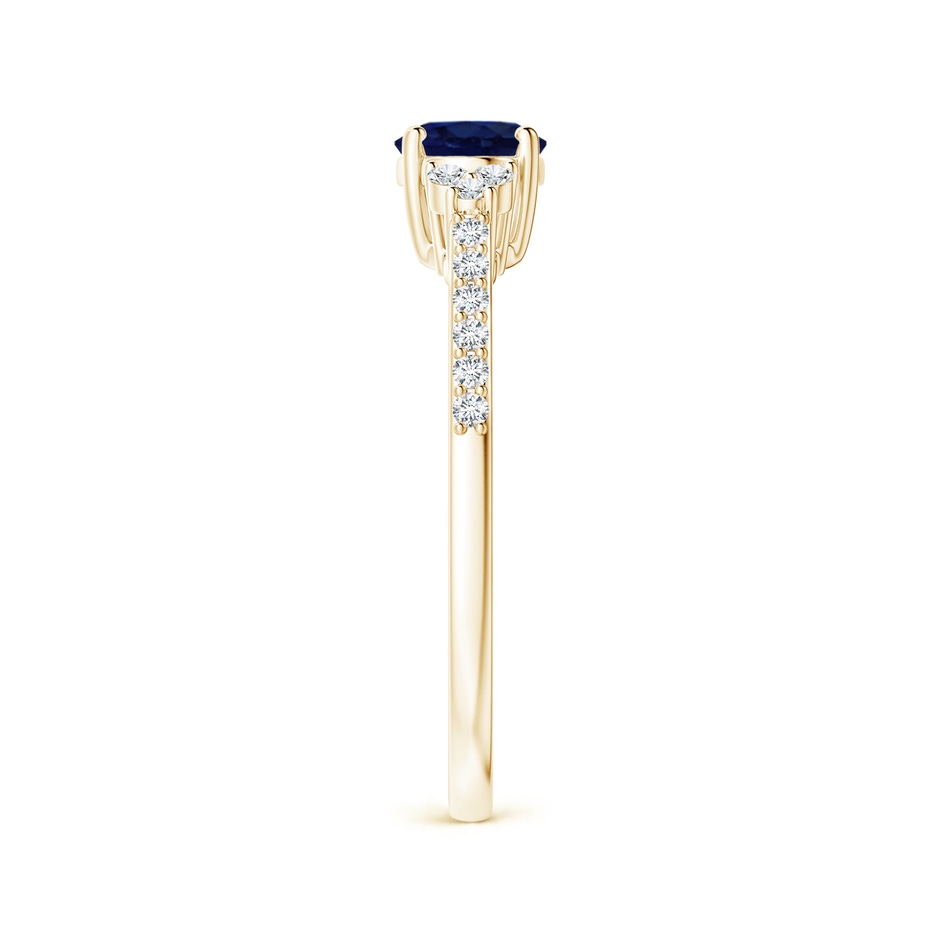 7x5mm A Horizontally Set Oval Sapphire Solitaire Ring with Trio Diamond Accents in Yellow Gold side 299