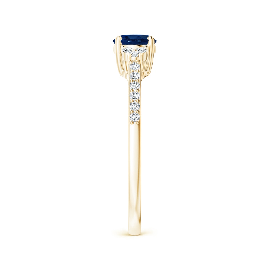7x5mm AA Horizontally Set Oval Sapphire Solitaire Ring with Trio Diamond Accents in Yellow Gold side 299
