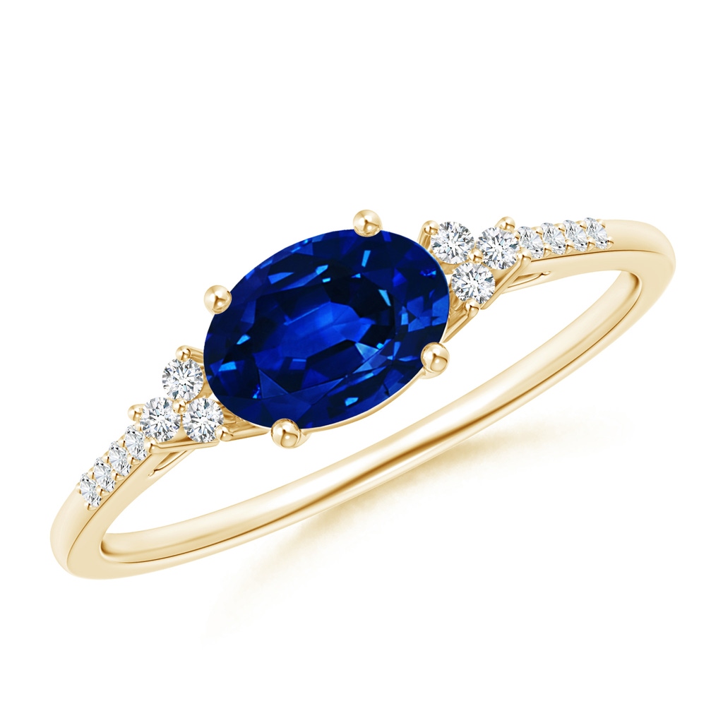 7x5mm AAAA Horizontally Set Oval Sapphire Solitaire Ring with Trio Diamond Accents in Yellow Gold