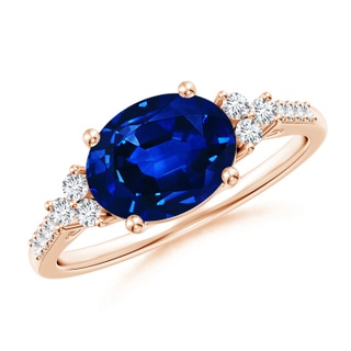 9x7mm AAAA Horizontally Set Oval Sapphire Solitaire Ring with Trio Diamond Accents in Rose Gold