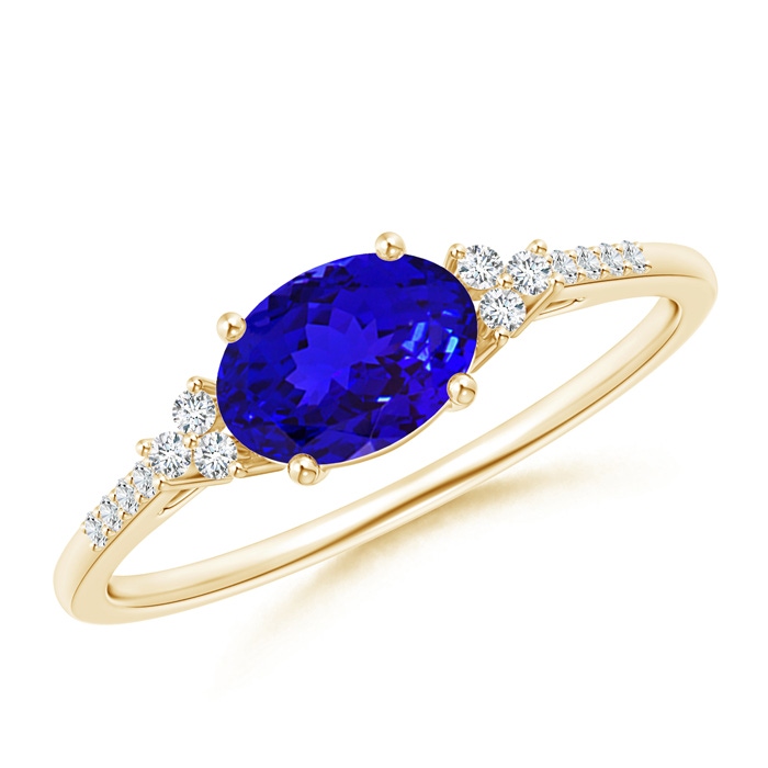 7x5mm AAAA Horizontally Set Oval Tanzanite Solitaire Ring with Trio Diamond Accents in Yellow Gold