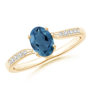 7x5mm A Solitaire London Blue Topaz Bypass Ring with Pavé Diamonds in 9K Yellow Gold
