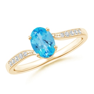 7x5mm AAA Solitaire Swiss Blue Topaz Bypass Ring with Pavé Diamonds in 9K Yellow Gold
