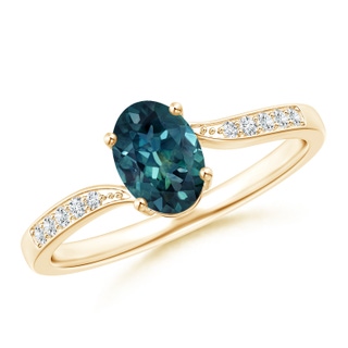 7x5mm AAA Solitaire Oval Teal Montana Sapphire Bypass Ring with Diamonds in 9K Yellow Gold