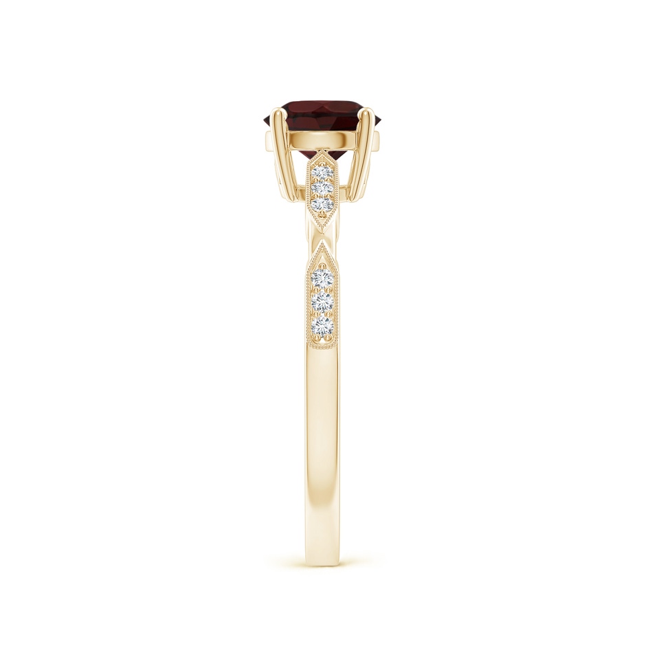 6mm A Classic Round Garnet Solitaire Ring with Diamond Accents in Yellow Gold product image