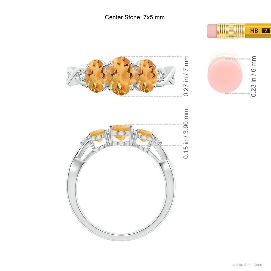 7x5mm A Oval Citrine Three Stone Criss-Cross Ring in White Gold ruler