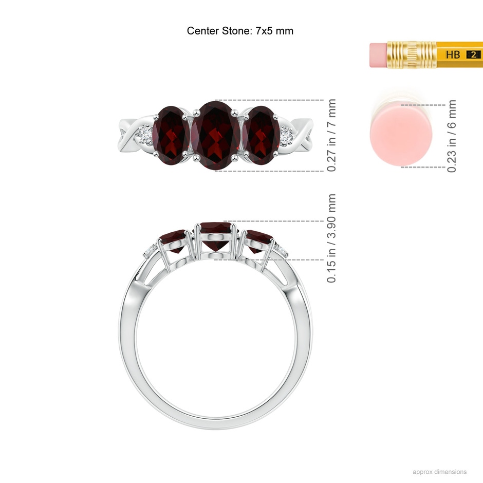 7x5mm A Oval Garnet Three Stone Criss-Cross Ring in White Gold ruler