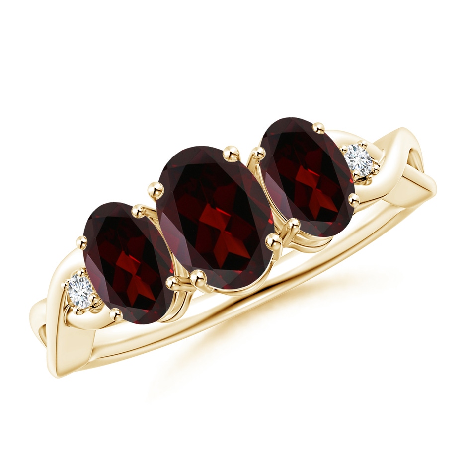 7x5mm A Oval Garnet Three Stone Criss-Cross Ring in Yellow Gold 