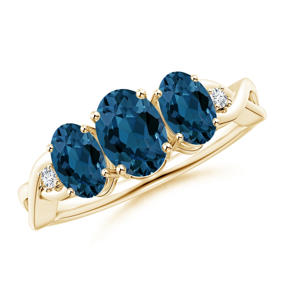 7x5mm AAA Oval London Blue Topaz Three Stone Criss-Cross Ring in Yellow Gold 