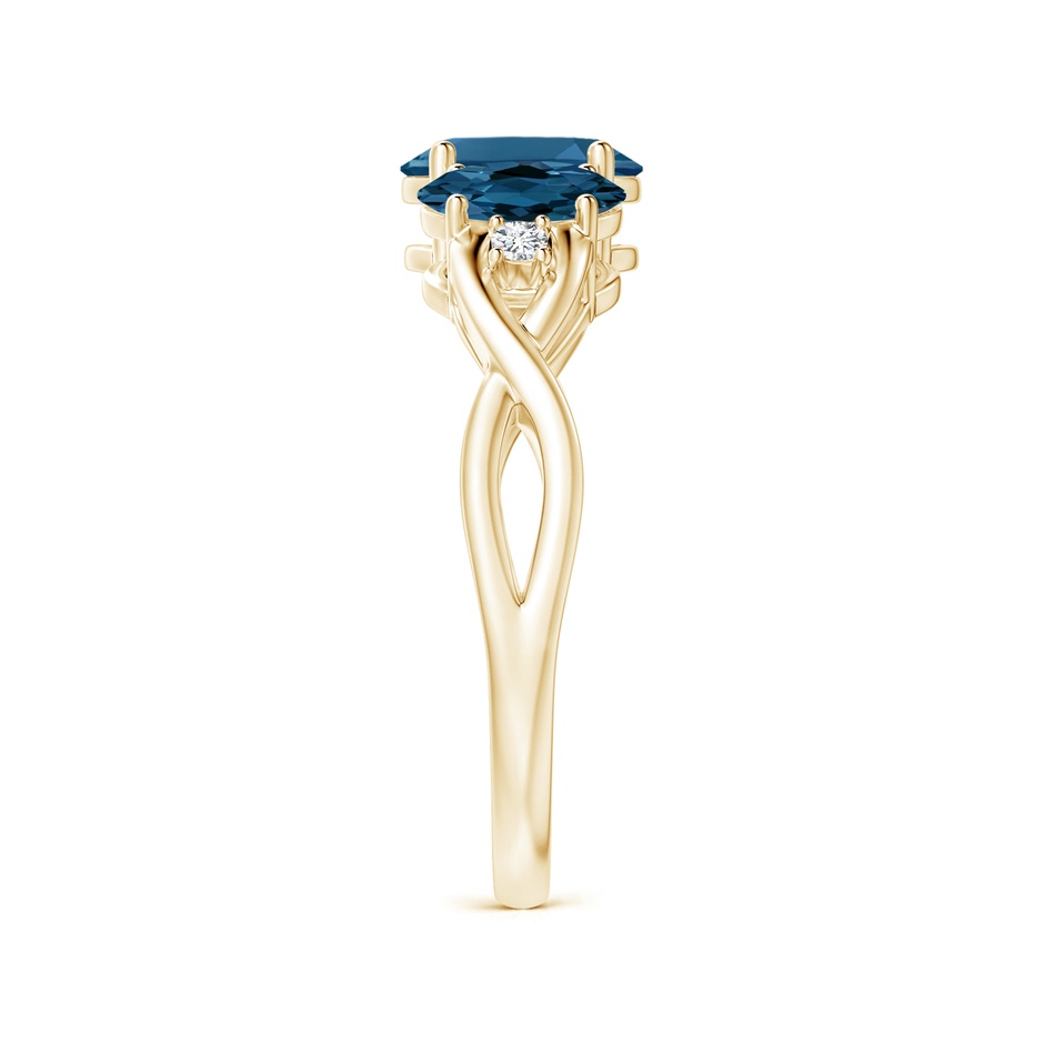 7x5mm AAA Oval London Blue Topaz Three Stone Criss-Cross Ring in Yellow Gold product image