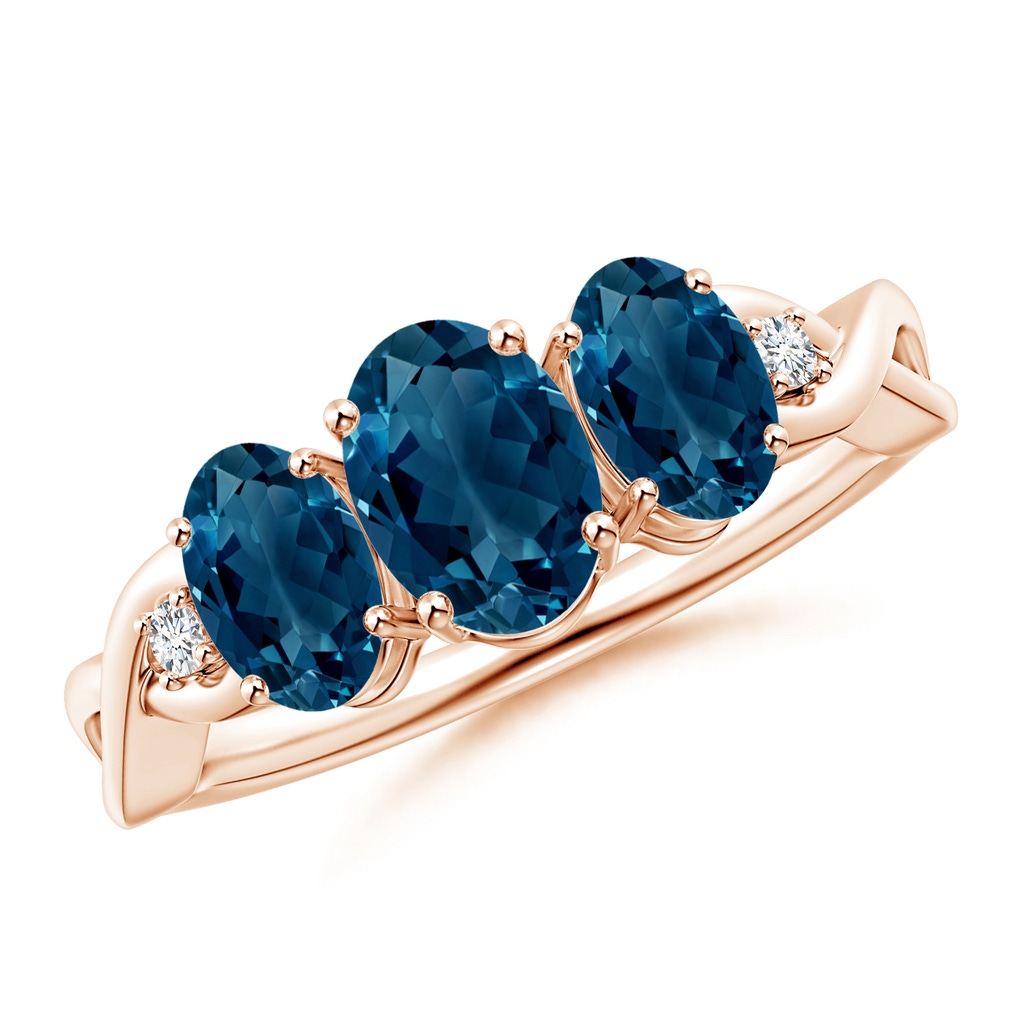 7x5mm AAAA Oval London Blue Topaz Three Stone Criss-Cross Ring in 9K Rose Gold