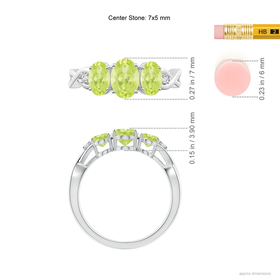 7x5mm A Oval Peridot Three Stone Criss-Cross Ring in White Gold ruler