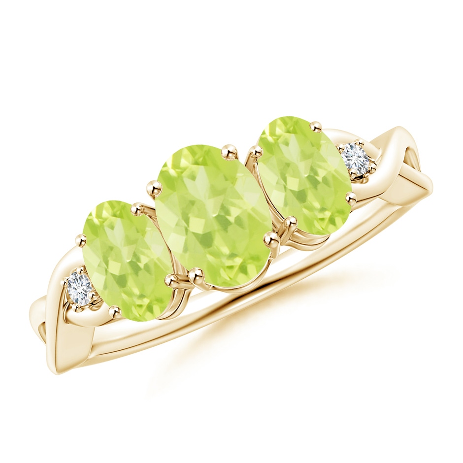 7x5mm A Oval Peridot Three Stone Criss-Cross Ring in Yellow Gold 