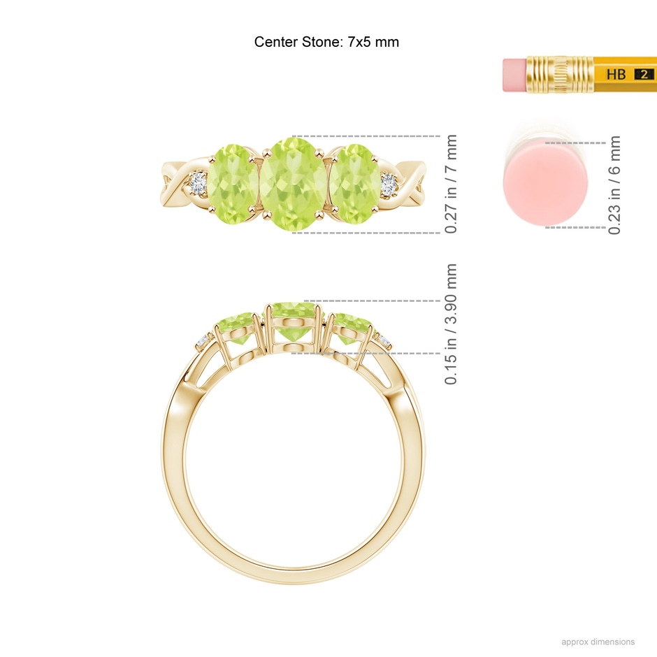 7x5mm A Oval Peridot Three Stone Criss-Cross Ring in Yellow Gold ruler