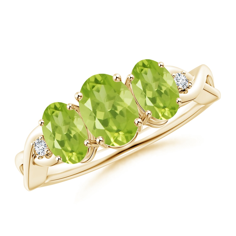 7x5mm AA Oval Peridot Three Stone Criss-Cross Ring in Yellow Gold 
