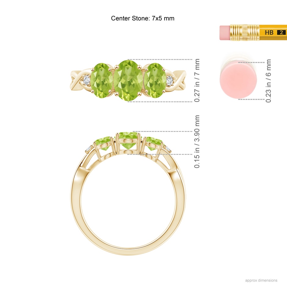 7x5mm AA Oval Peridot Three Stone Criss-Cross Ring in Yellow Gold ruler