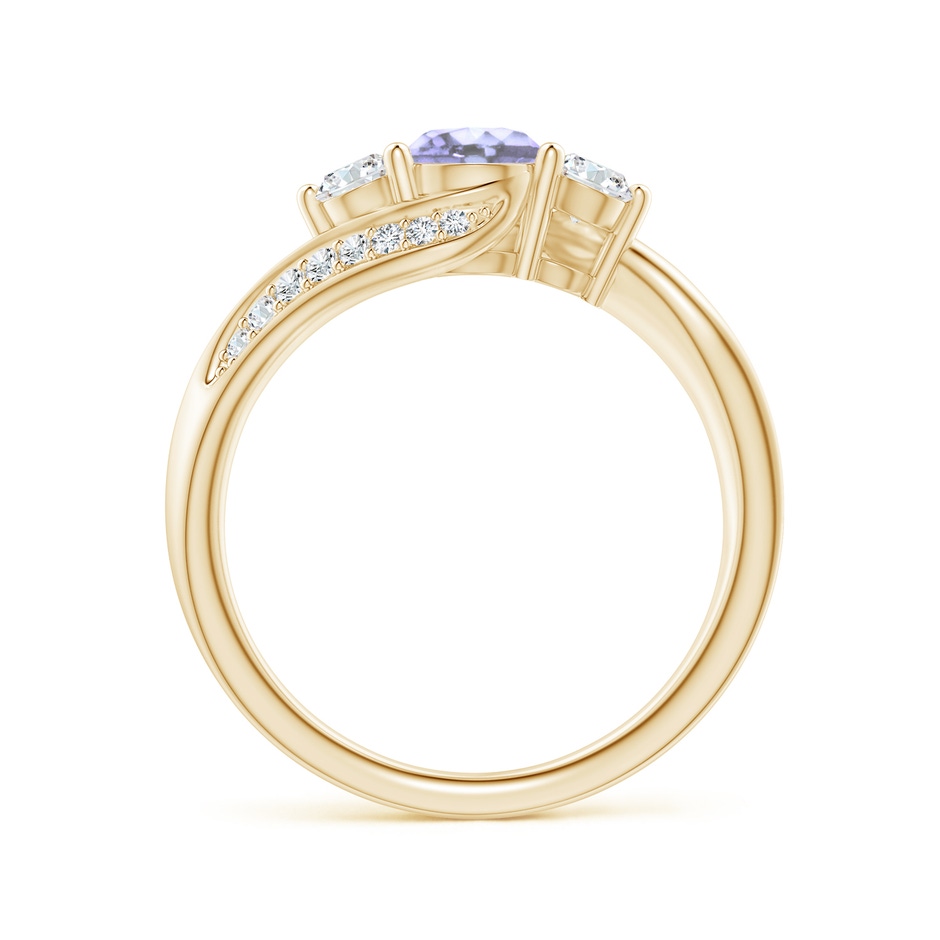 5mm A Tanzanite and Diamond Three Stone Bypass Ring in Yellow Gold side 1