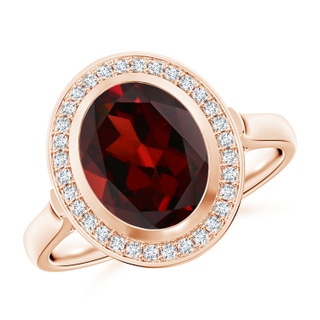 10x8mm AAA Bezel-Set Oval Garnet Ring with Diamond Halo in Rose Gold