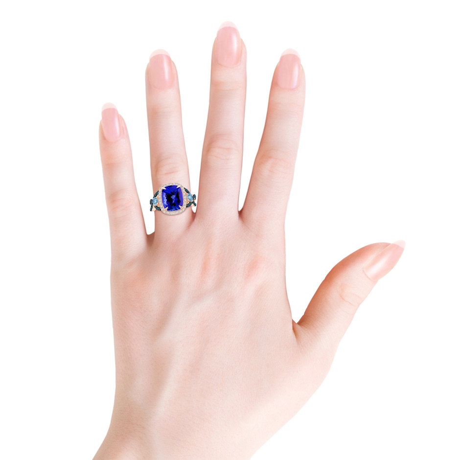 11x9mm AAAA Tanzanite and Aquamarine Crossover Ring with Halo in Rose Gold body-hand