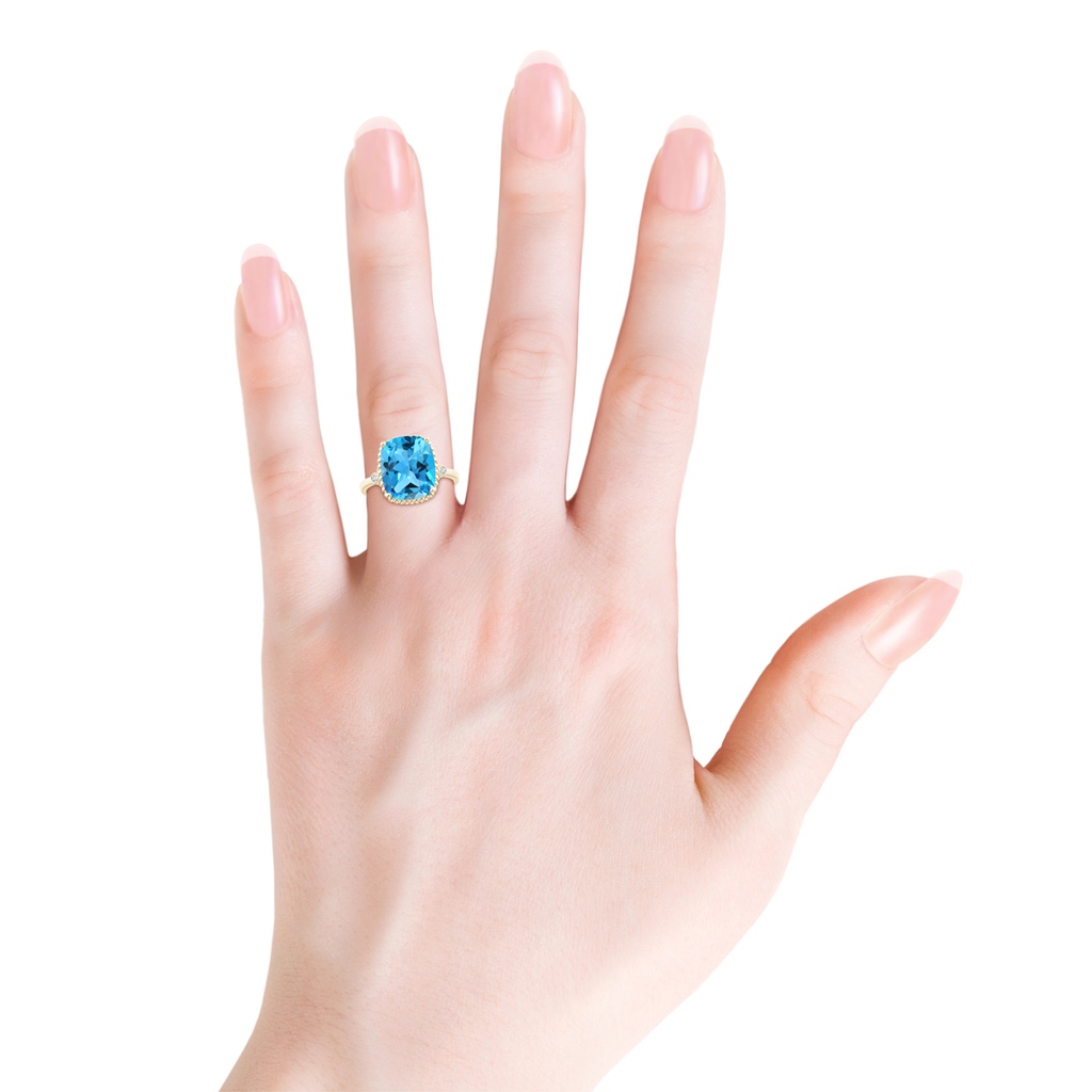 12x10mm AAA Cushion Swiss Blue Topaz Beaded Halo Ring with Diamonds in Yellow Gold Body-Hand