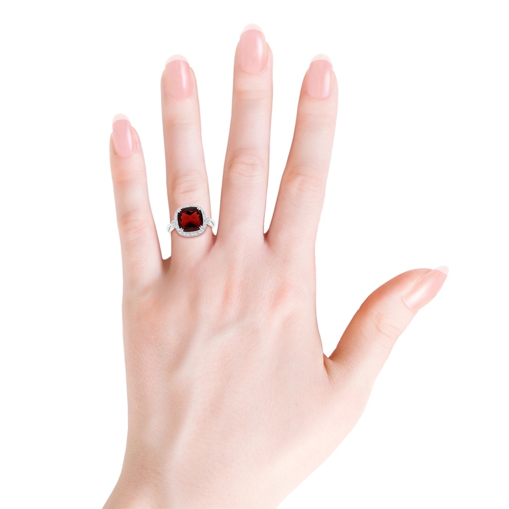 10mm AAA Cushion Garnet Reverse Tapered Shank Cocktail Halo Ring in White Gold Body-Hand