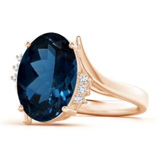14.12x10.14x6.99mm AAAA GIA Certified London Blue Topaz Bypass Ring with Diamonds in 10K Rose Gold