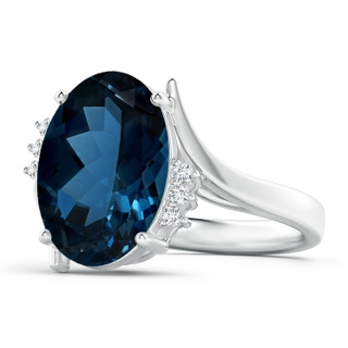 14.12x10.14x6.99mm AAAA GIA Certified London Blue Topaz Bypass Ring with Diamonds in 18K White Gold