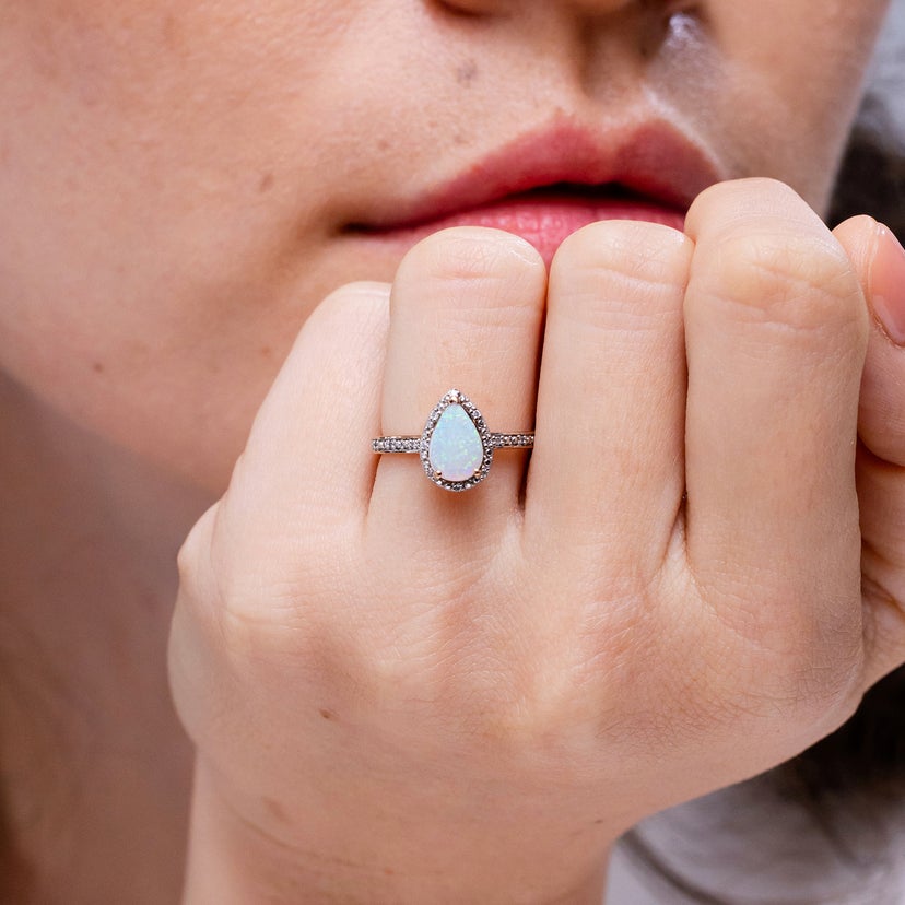 Prong-Set Pear-Shaped Opal Ring with Beaded Halo