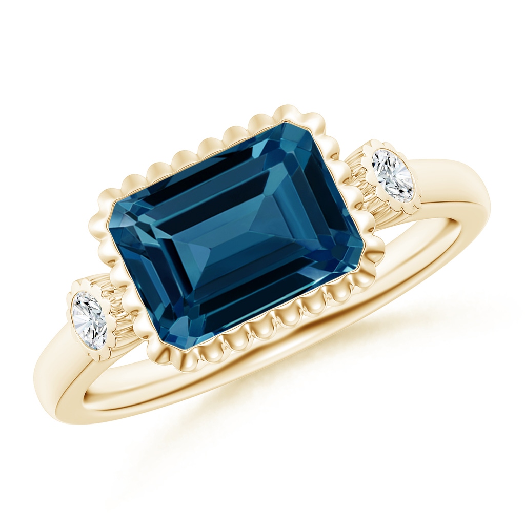 9x7mm AAAA East-West Emerald-Cut London Blue Topaz Ring with Diamonds in Yellow Gold