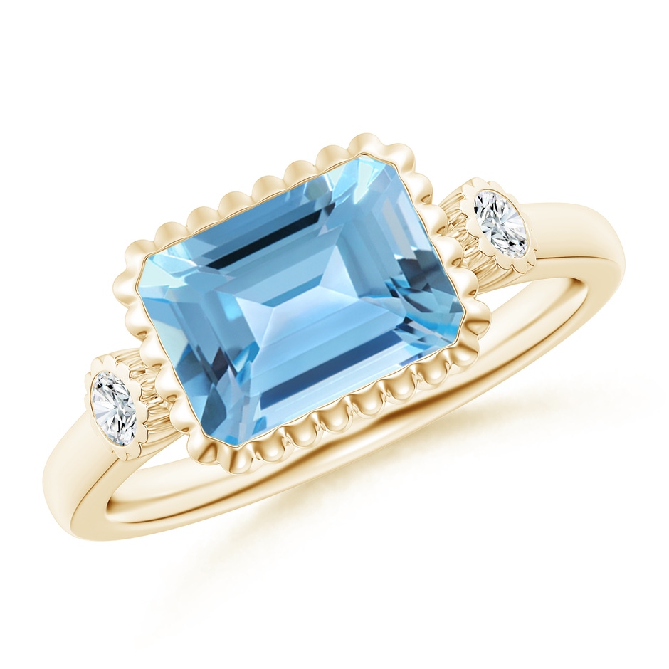 9x7mm A East-West Emerald-Cut Swiss Blue Topaz Ring with Diamonds in Yellow Gold 