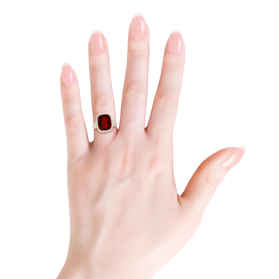 12x10mm AAAA Cushion Garnet Split Shank Cocktail Ring with Pear Motif in Yellow Gold body-hand