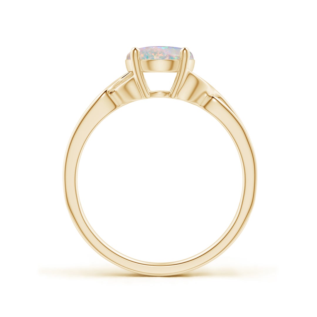 9x7mm AAAA Classic Oval Opal Criss-Cross Cocktail Ring in Yellow Gold - side 1