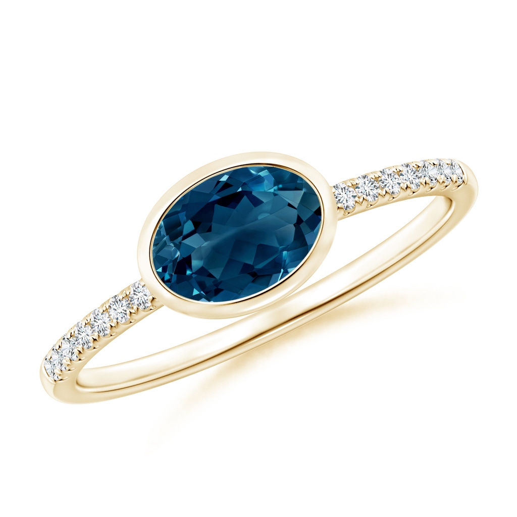 7x5mm AAAA East-West Bezel-Set Oval London Blue Topaz and Diamond Ring in Yellow Gold