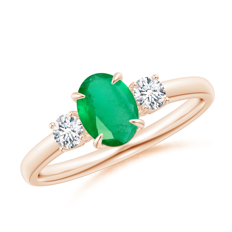 7x5mm A Oval Emerald and Round Diamond Three Stone Ring in Rose Gold 