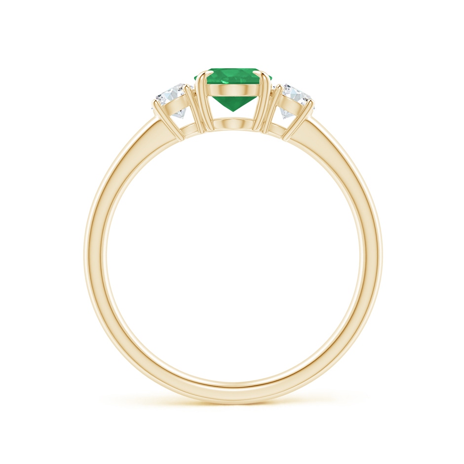7x5mm A Oval Emerald and Round Diamond Three Stone Ring in Yellow Gold side 1