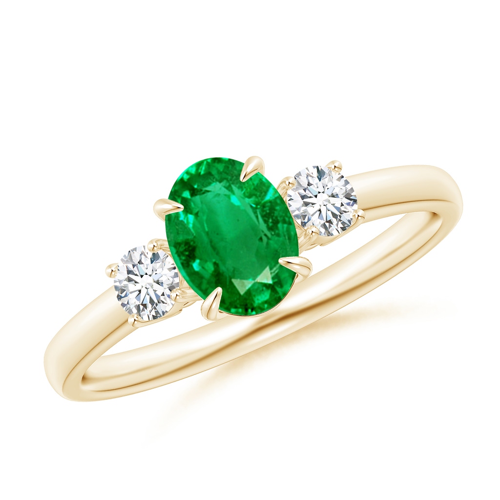 7x5mm AAA Oval Emerald and Round Diamond Three Stone Ring in Yellow Gold