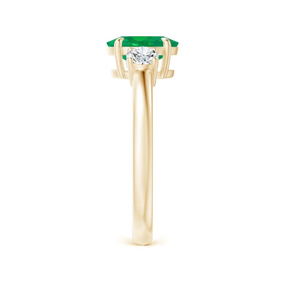 8x6mm AA Oval Emerald and Round Diamond Three Stone Ring in Yellow Gold side 2