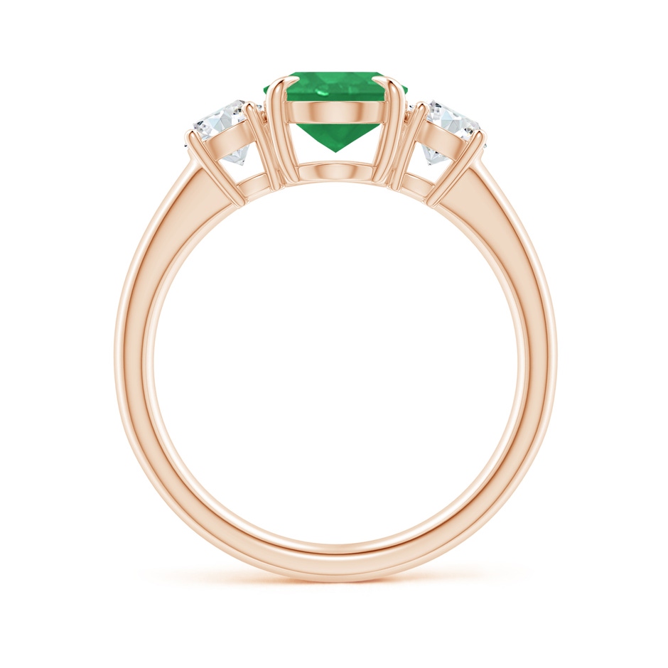 9x7mm A Oval Emerald and Round Diamond Three Stone Ring in Rose Gold Side 1