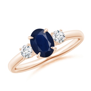 7x5mm A Oval Sapphire and Round Diamond Three Stone Ring in 10K Rose Gold