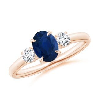 7x5mm AA Oval Sapphire and Round Diamond Three Stone Ring in 10K Rose Gold