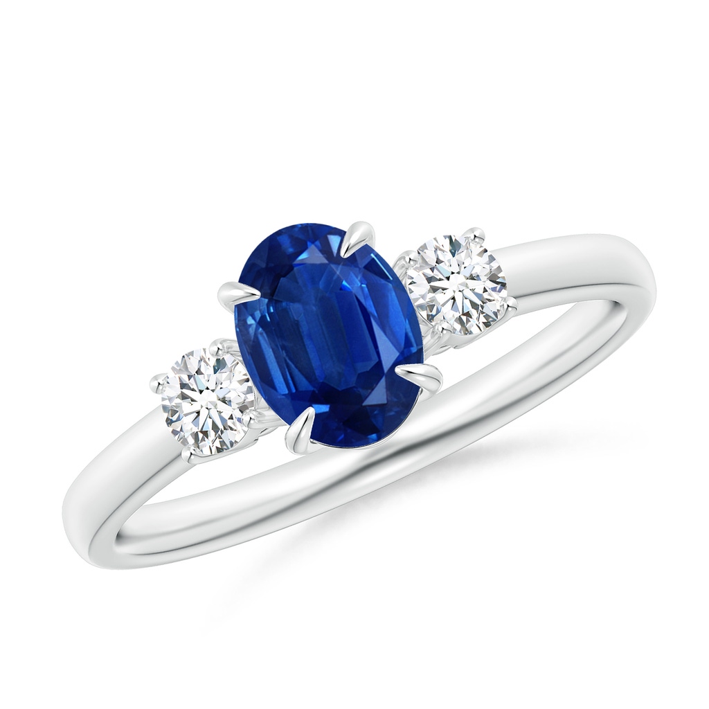 7x5mm AAA Oval Sapphire and Round Diamond Three Stone Ring in White Gold