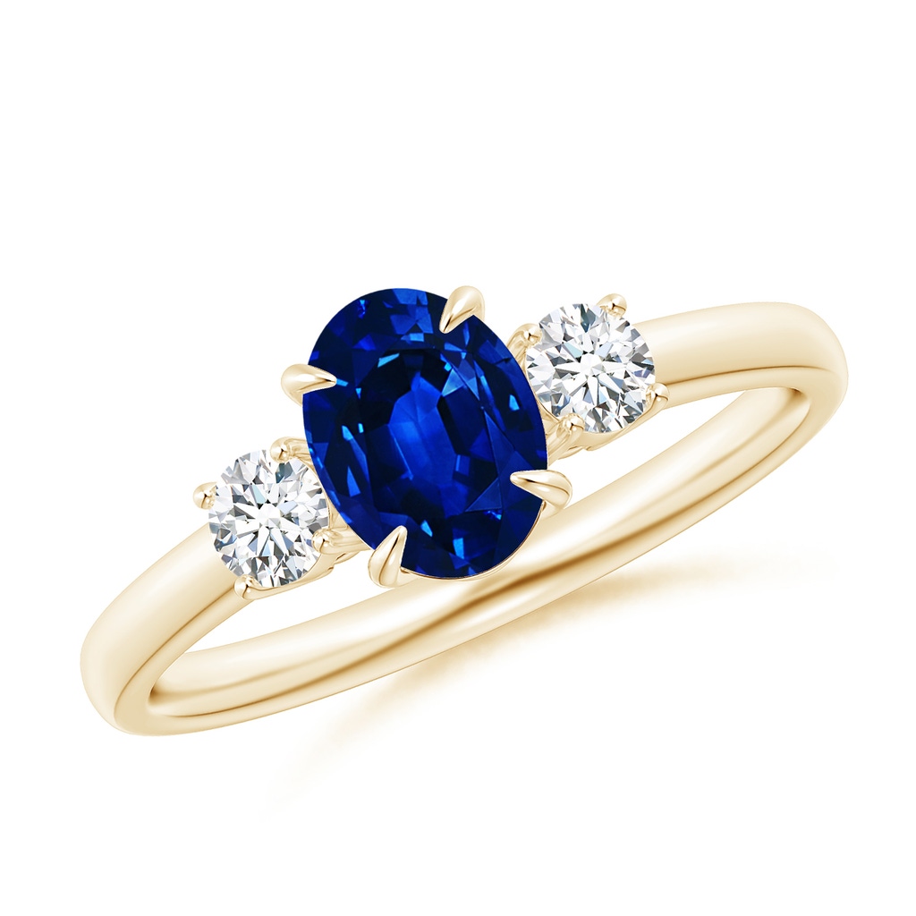 7x5mm AAAA Oval Sapphire and Round Diamond Three Stone Ring in Yellow Gold