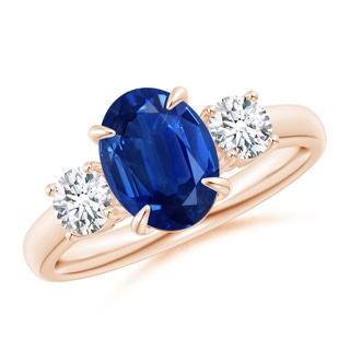 9x7mm AAA Oval Sapphire and Round Diamond Three Stone Ring in 10K Rose Gold