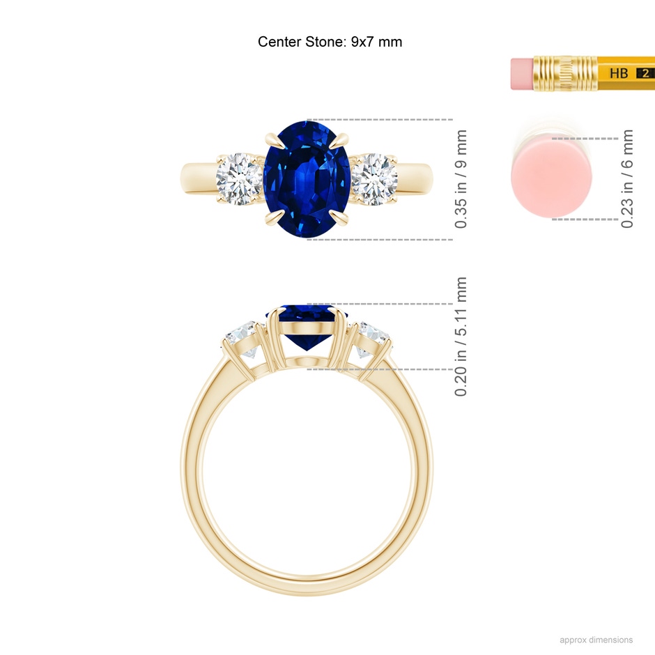 9x7mm Lab-Grown Oval Sapphire and Round Diamond Three Stone Ring in Yellow Gold ruler