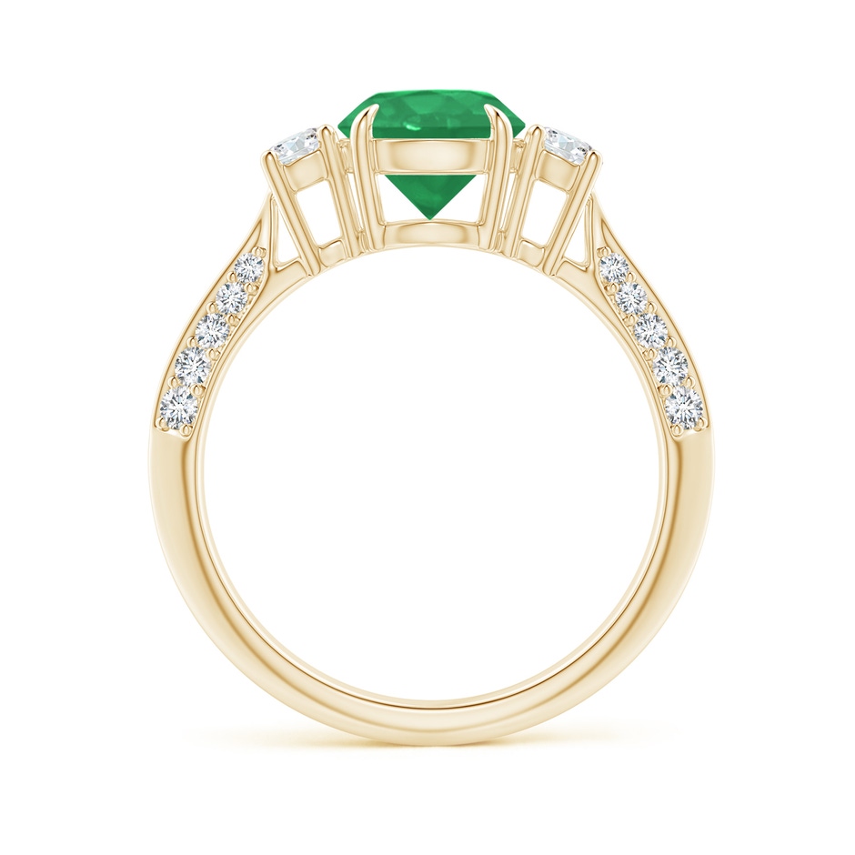 7mm A Three Stone Emerald and Diamond Knife-Edge Shank Ring in Yellow Gold side 1