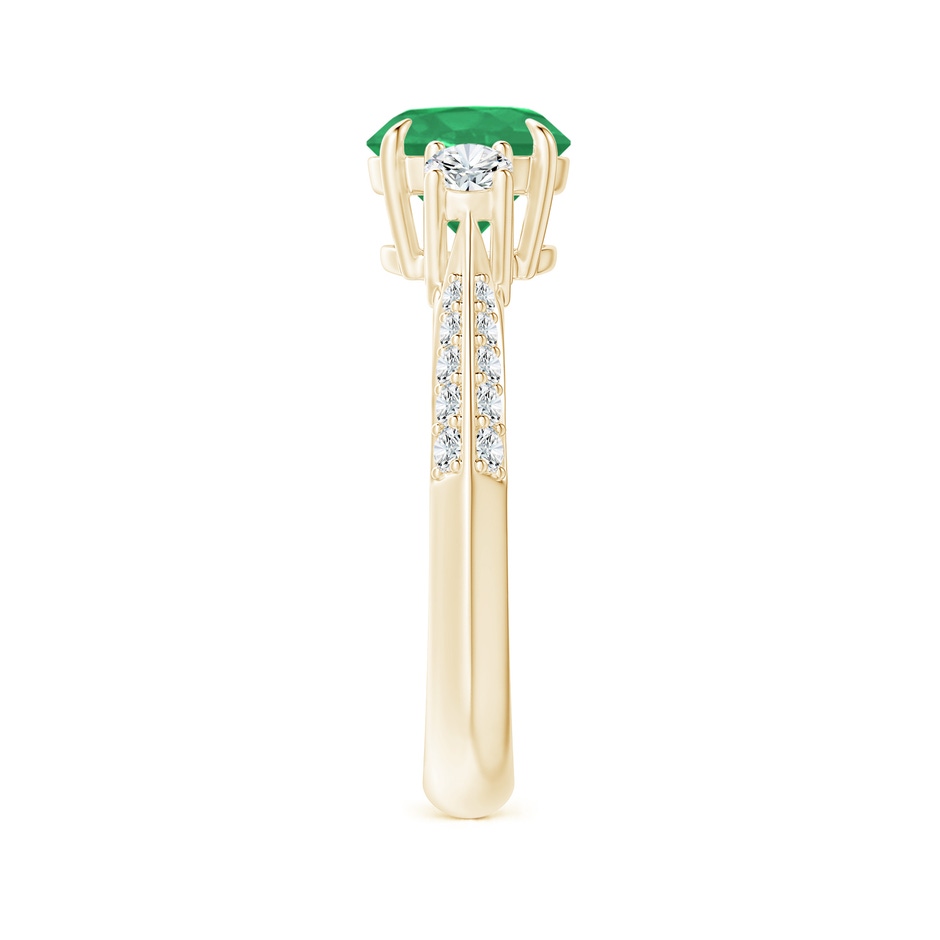7mm A Three Stone Emerald and Diamond Knife-Edge Shank Ring in Yellow Gold side 2